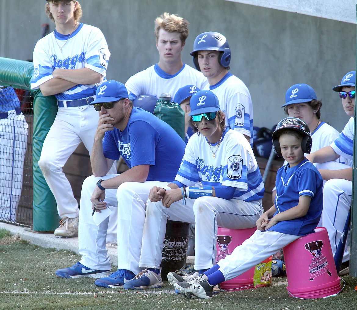 The dugout looks on as the 2-0 pitch is delivered to Landon Haddock against Claremont Thursday evening in the Big Bucks Tournament at Lee Gehring Field. (Paul Sievers/The Western News)