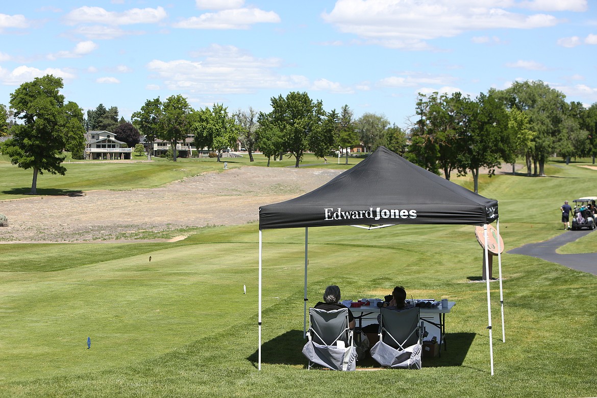 The golf scramble had many sponsors with tents spread throughout the course.