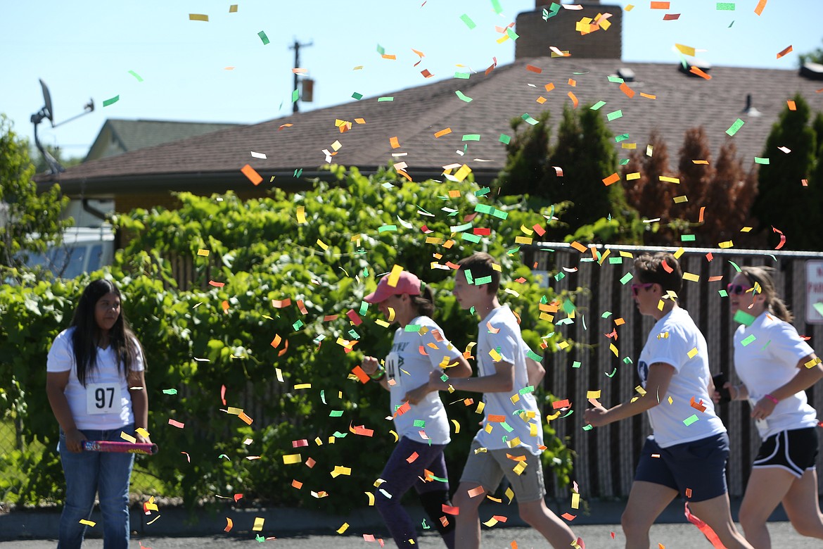 The run began with confetti at the start point, and the runners were off.