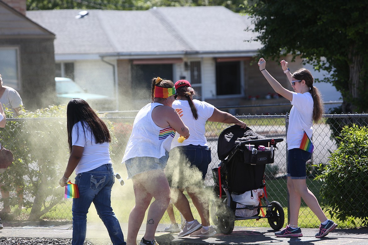 Color stations were posted along the route, with colored powder thrown onto the runner’s shirts.