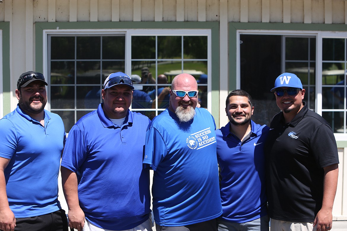 The Warden wrestling staff came together to put on the golf tournament to raise money for an upcoming camp in July.