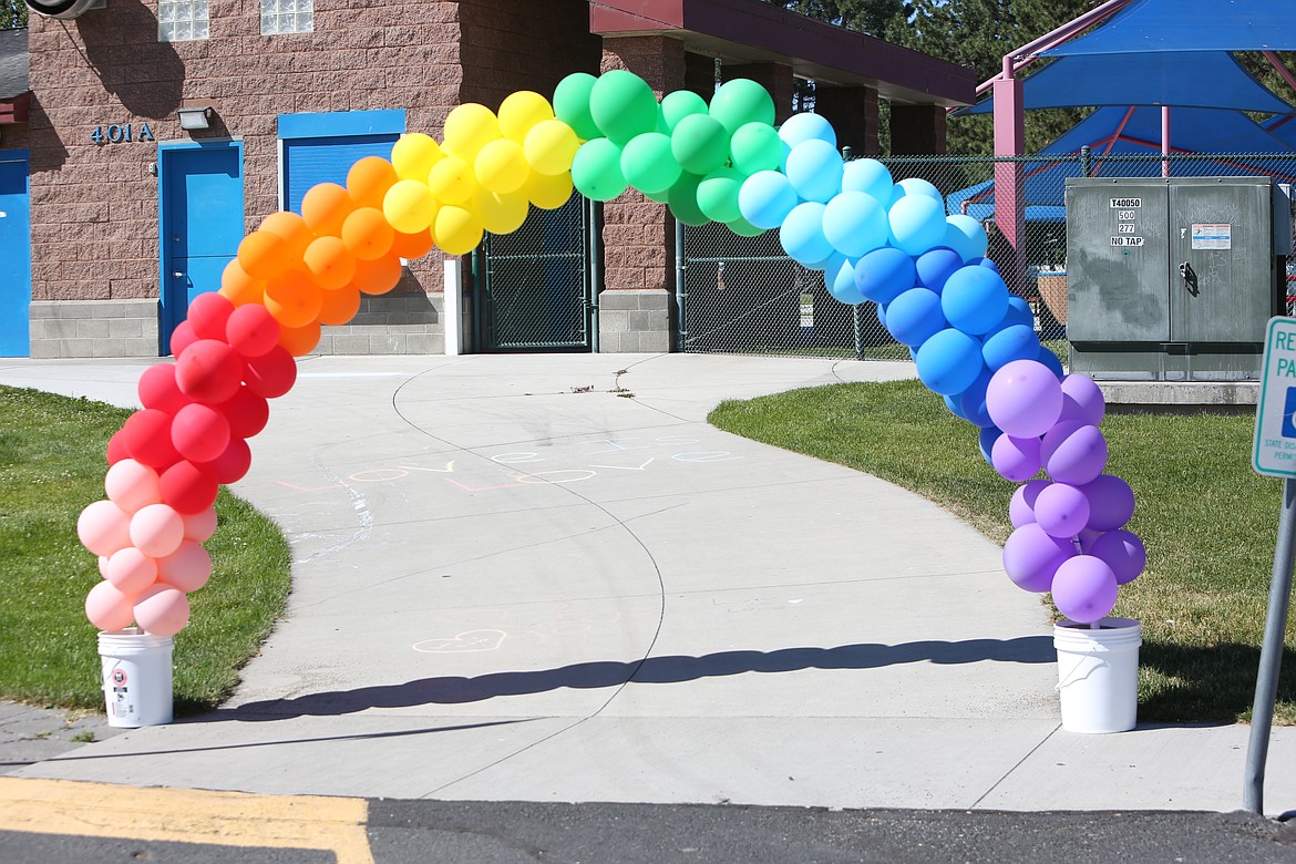 The Pride Color Run featured rainbow-themed stations around Moses Lake, including a rainbow balloon arch finishing line.
