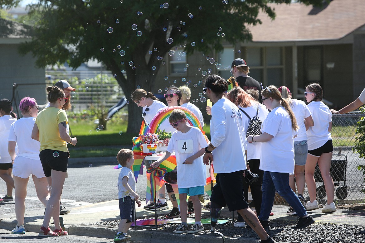 Color stations along the two-mile route had flags, bubbles and more to entertain participants during the run.