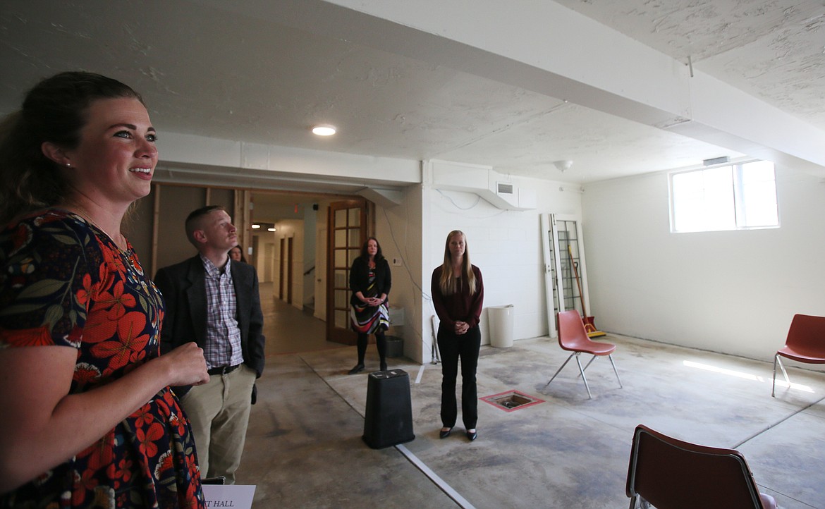 Coeur du Christ Academy teachers and administrators tour the basement of the historical First United Methodist Church in downtown Coeur d'Alene where the school will open in the fall.