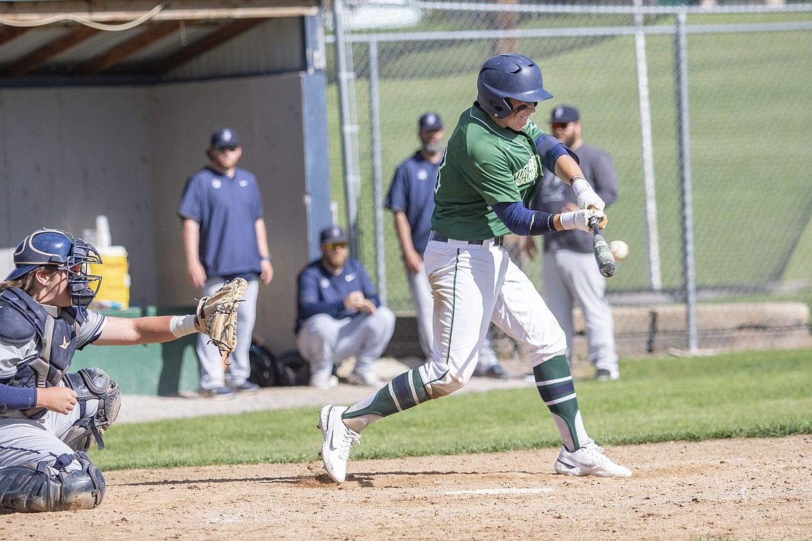 Mission Valley Mariner Espn Fisher makes contact for a base hit. (Rob Zolman/Lake County Leader)