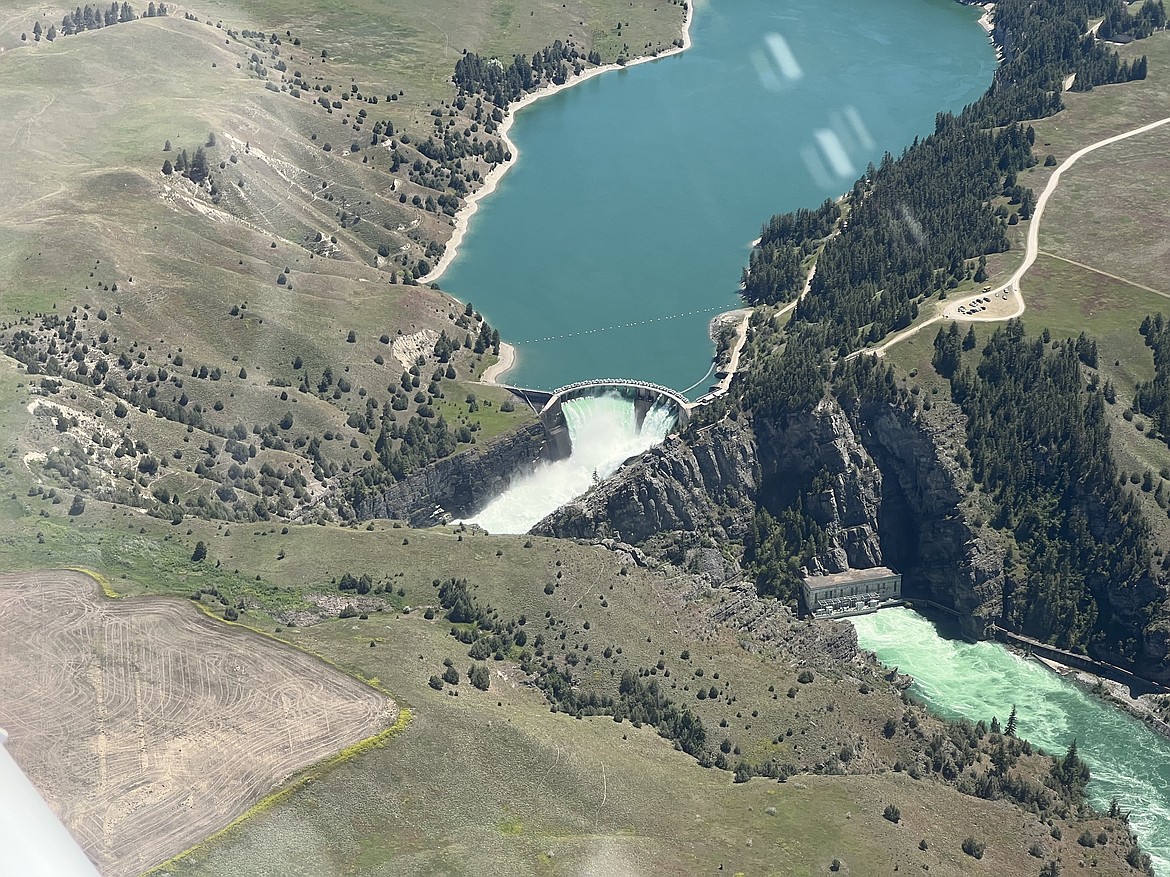 Bigfork resident David Green captured this image Sunday during a flight over Flathead Lake and the SKQ Dam in Polson. The lake elevation has gradually lowered over the last week and is project to reach its normal summer level by June 30. (David Green photo)