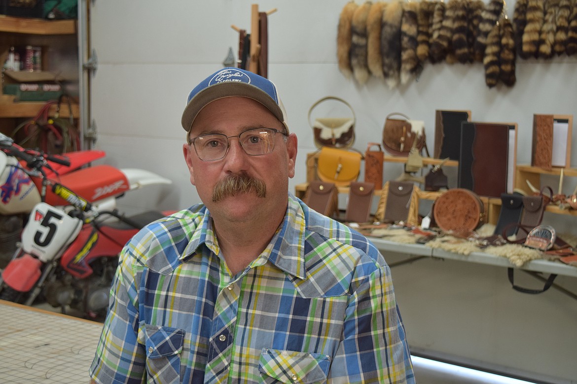 Jereme Roy, the owner of Roy’s Custom Leather Work and Repair, in his workshop northwest of Moses Lake. Roy and his wife Trudie make a number of leather items — wallets, purses, handbags, folders — that they sell at local farmers markets, rodeos and horse shows.