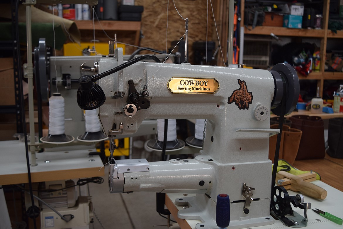 Two heavy-duty cowboy sewing machines Jereme and Trudie Roy use. While the sewing machines make stitching leather much easier, Jereme Roy said they were by far the biggest investment he’s made in the business.