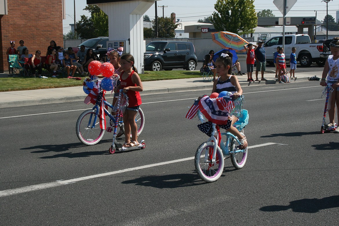 Children decorated their bikes and scooters for the 2021 July 4 parade in Othello. The 2022 parade will be part of Monday’s July 4 celebration.