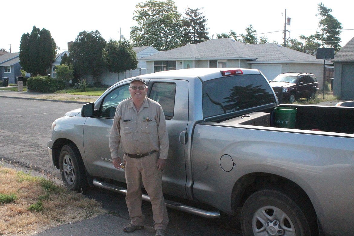 Moses Lake handyman Robert Heslop stands outside his work truck Tuesday morning. Heslop’s RH Repair is a one-man operation; he enjoys taking on small, short-term projects that wouldn’t interest larger contractors, he said.