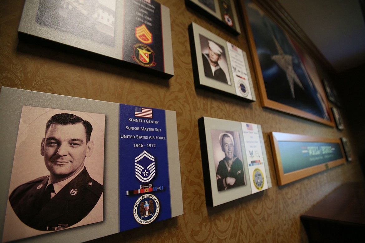 Images of Garden Plaza residents and employees who served in the military are accompanied on the Wall of Honor by emblems and accolades honoring their service.