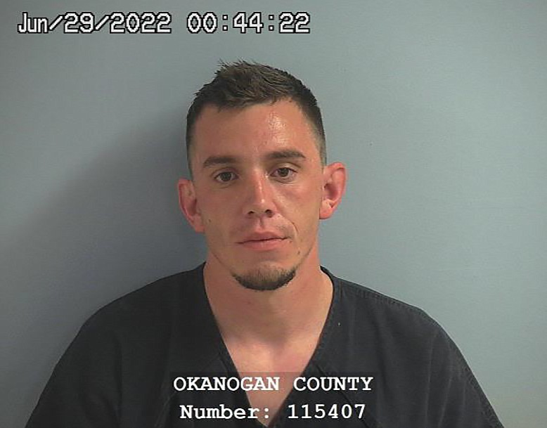 Samuel Adams, 28, was arrested in association with an alleged burglary in Okanogan County.