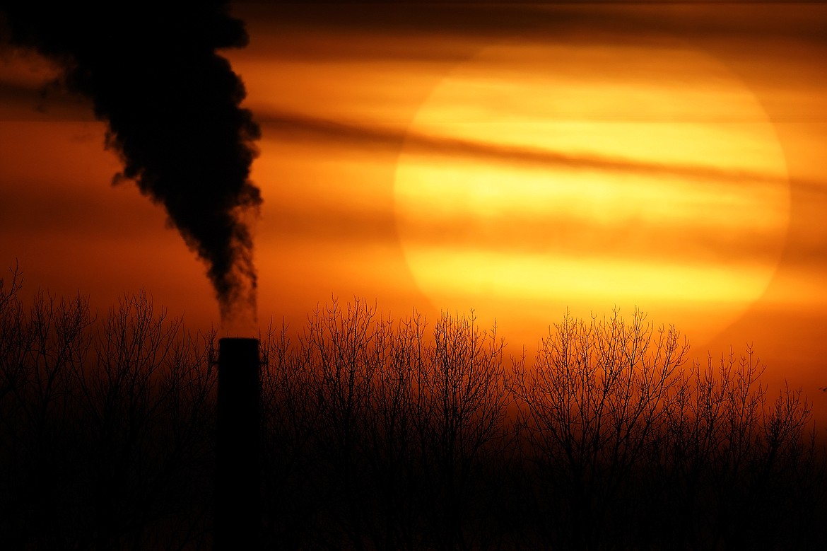 FILE - Steam billows from a coal-fired power plant Nov. 18, 2021, in Craig, Colo. The Supreme Court on Thursday, June 30, 2022, limited how the nation’s main anti-air pollution law can be used to reduce carbon dioxide emissions from power plants. By a 6-3 vote, with conservatives in the majority, the court said that the Clean Air Act does not give the Environmental Protection Agency broad authority to regulate greenhouse gas emissions from power plants that contribute to global warming. (AP Photo/Rick Bowmer, File)