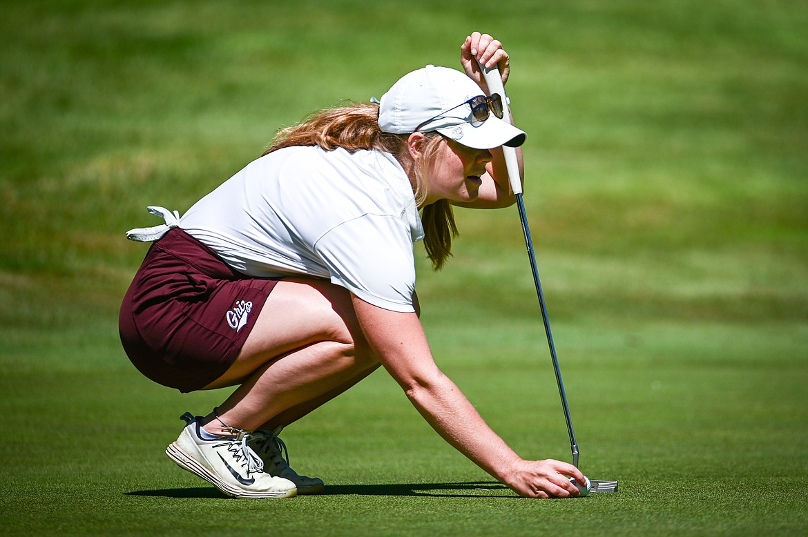 Teigan Avery lines up a putt on the tenth green of the South Course during the Earl Hunt Memorial Fourth of July Tournament at Whitefish Lake Golf Club on Thursday, June 30. (Casey Kreider/Daily Inter Lake)