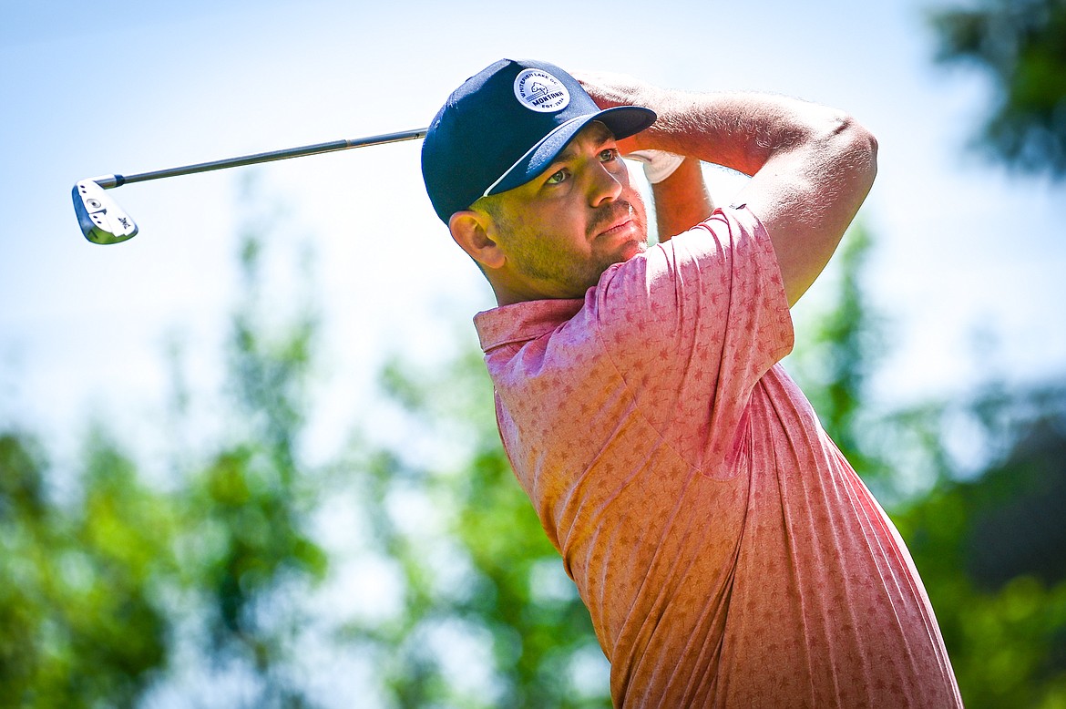 Art Doorn watches his tee shot on the second hole of the North Course during the Earl Hunt Memorial Fourth of July Tournament at Whitefish Lake Golf Club on Thursday, June 30. (Casey Kreider/Daily Inter Lake)