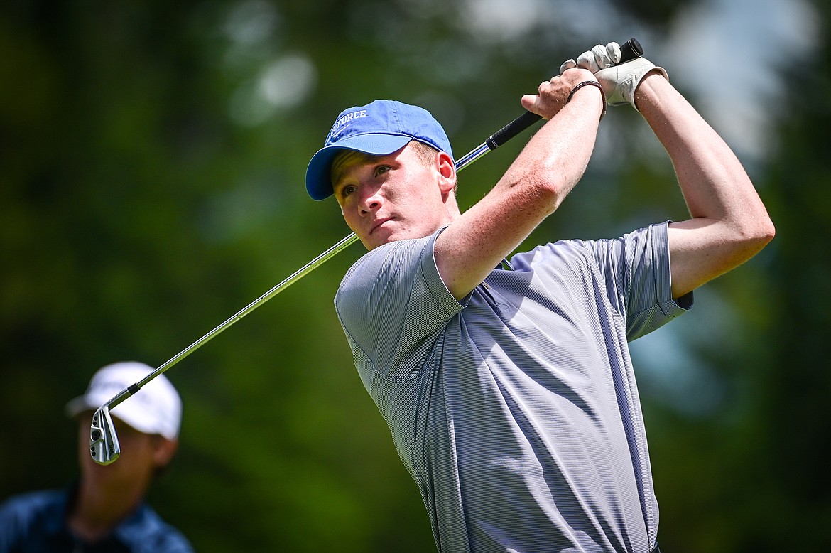 Cameron Kahle watches his tee shot on the second hole of the North Course during the Earl Hunt Memorial Fourth of July Tournament at Whitefish Lake Golf Club on Thursday, June 30. (Casey Kreider/Daily Inter Lake)