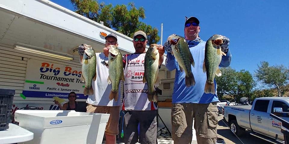 Anglers from last year’s Shootout at Potholes event pose with their fish during the weigh-in.