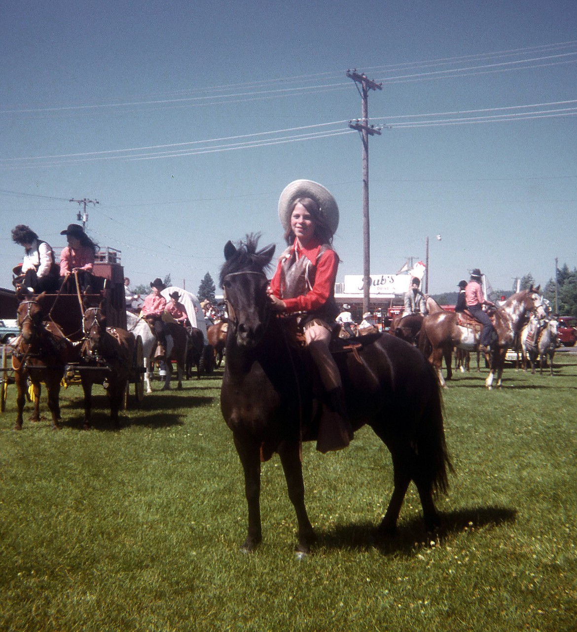 Mary Pandrea's daughter, Debbie, sits atop her pony, Babe, as she waits for the start of the Sandpoint Lions Fourth of July Children Parade to start in 1962.