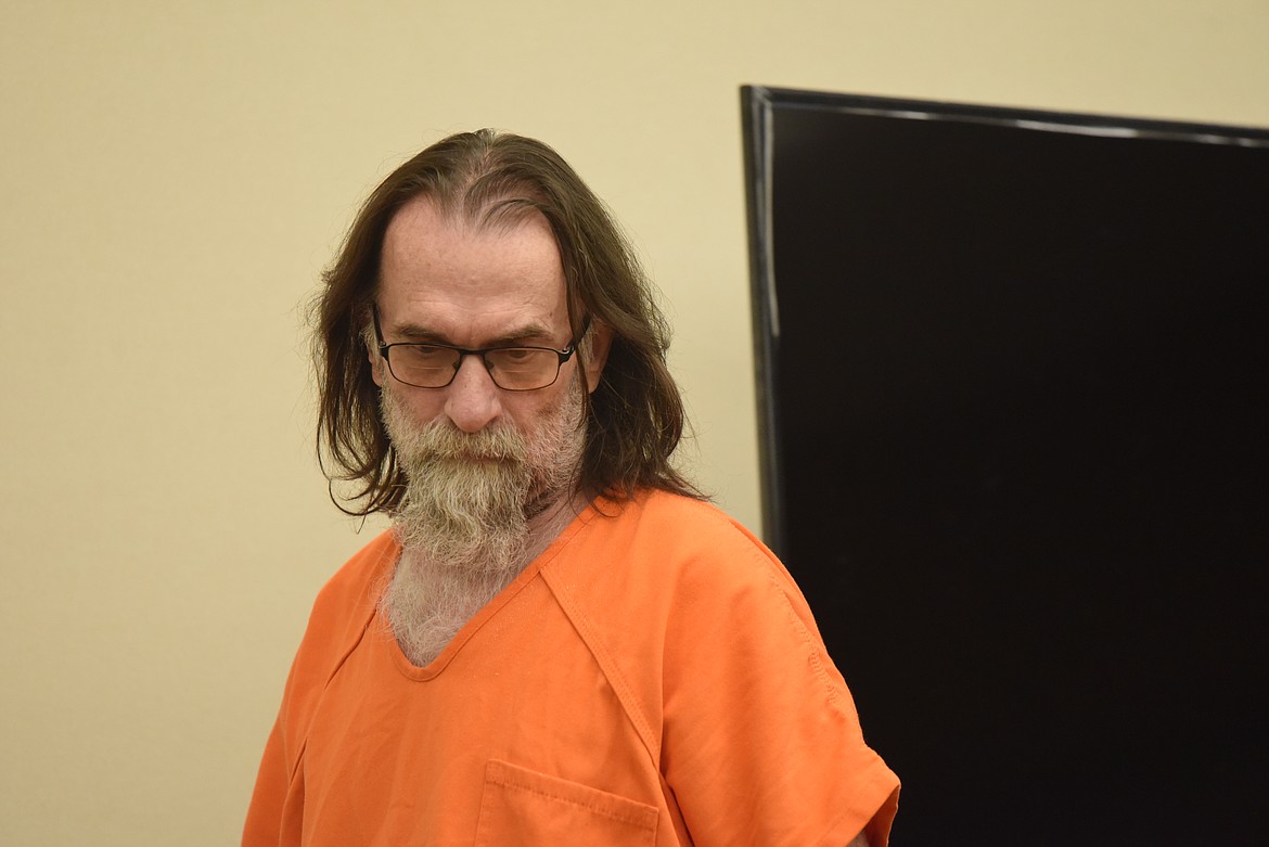 Larry Edmond Ross walks to the defendant's table in Flathead County District Court during his sentencing on two counts of sexual abuse on June 30, 2022. (Derrick Perkins/Daily Inter Lake)