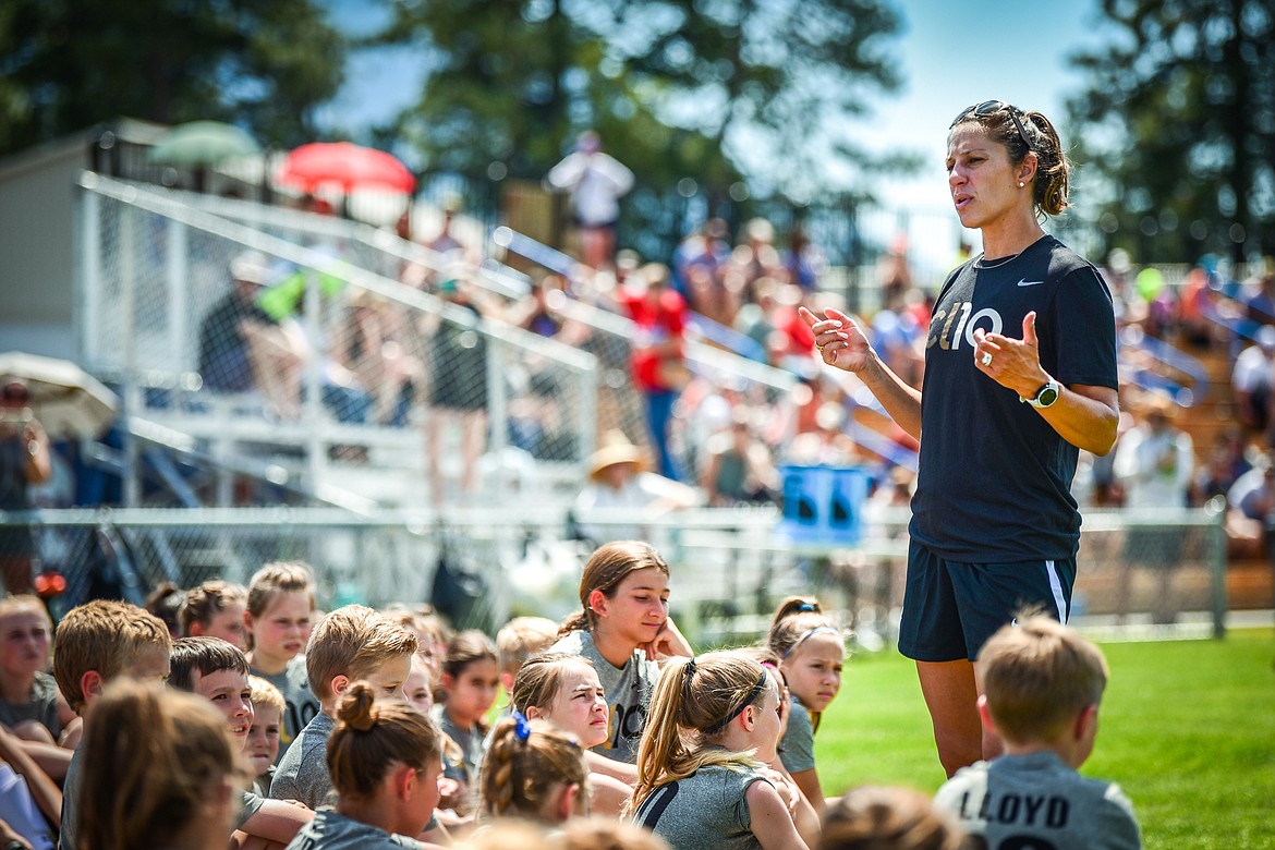 Carli Lloyd talks to kids at her CL10 Soccer Clinic at Flip Darling Memorial Field at Columbia Falls High School on Saturday, July 2. Lloyd is a former American professional soccer player; a two-time Olympic gold medalist; two-time FIFA Women's World Cup champion; two-time FIFA Player of the Year and a four-time Olympian. (Casey Kreider/Daily Inter Lake)