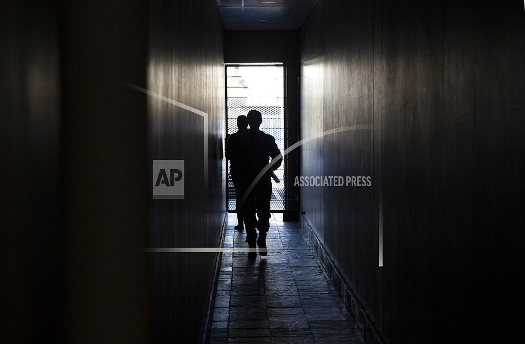 A dark passage during a power outage in a Johannesburg shopping centre, Thursday, June 30, 2022. South Africans are struggling in the dark to cope with increased power cuts that have hit households and businesses across the country. The rolling power cuts have been experienced for years but this week the country’s state-owned power utility Eskom extended them so that some residents and businesses have gone without power for more than 9 hours a day. (AP Photo/Denis Farrell)