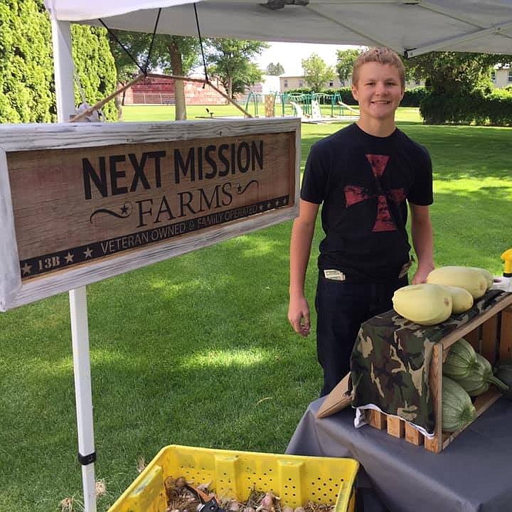 Jared Dormaier, 15, enjoys helping out at farmers markets where they sell their produce in the summers.