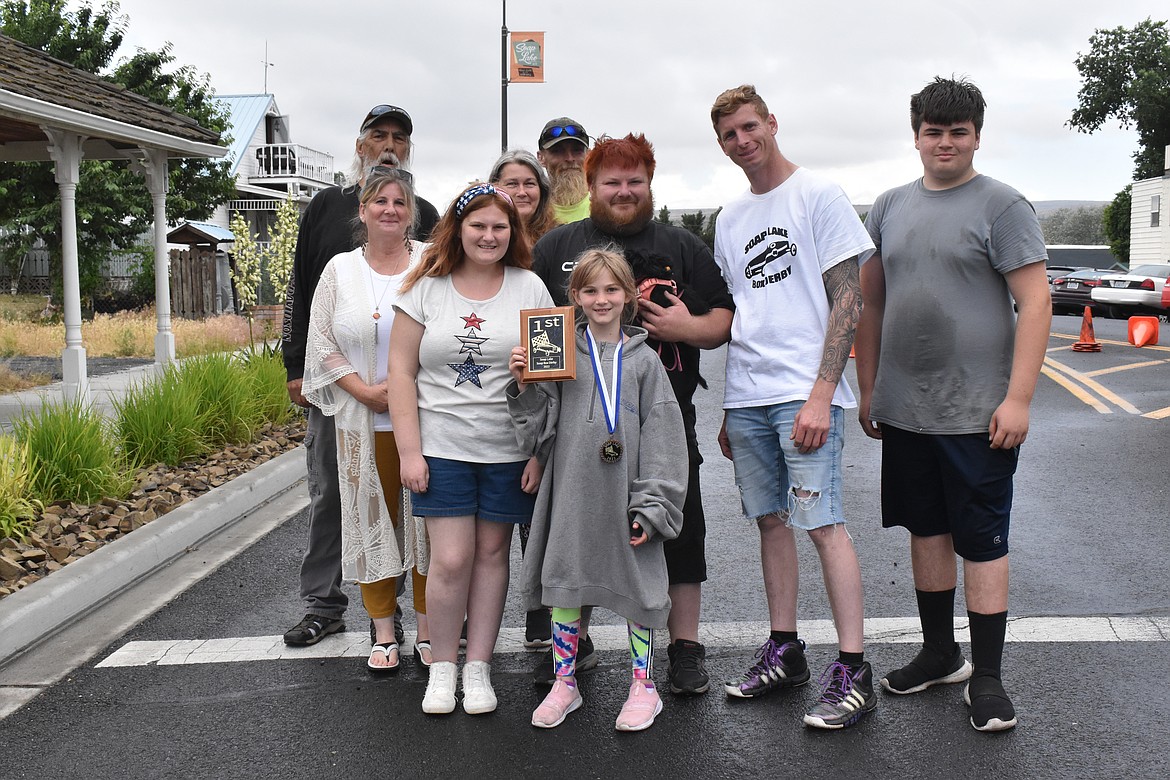 Langstyn Rhoads, who took first place, with her family that was there to support her.