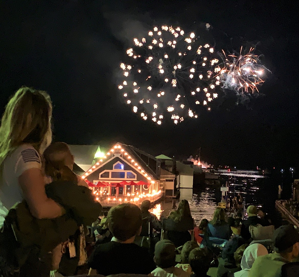 A crowd watches as fireworks light up the sky over Lake Pend Oreille at Bayview on Sunday night.