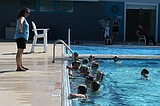 Quincy swim team helps connect community