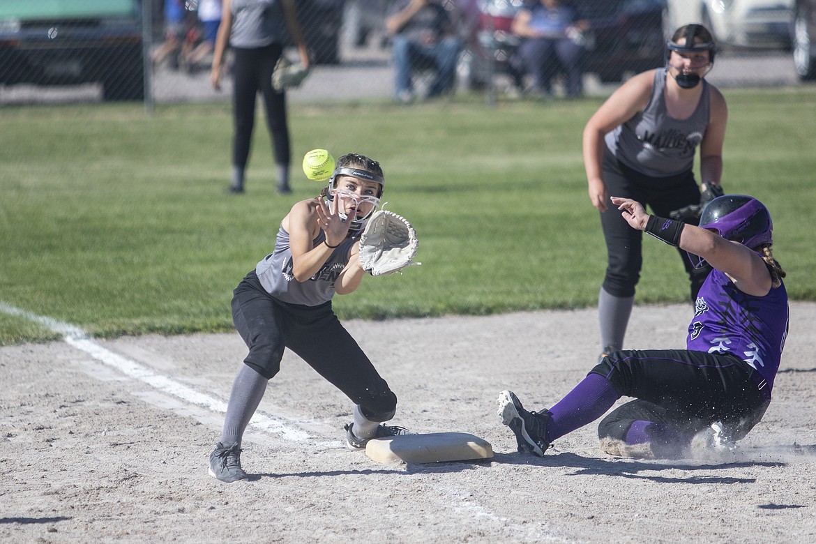 Ronan Mini Maiden Lizzy Cheff tries to put the tag on Lady Pirate base runner Abbi Sanford. (Rob Zolman/Lake County Leader)