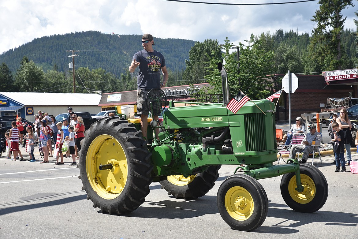 It isn't a parade without at least one John Deere tractor. (Scott Shindledecker/The Western News)