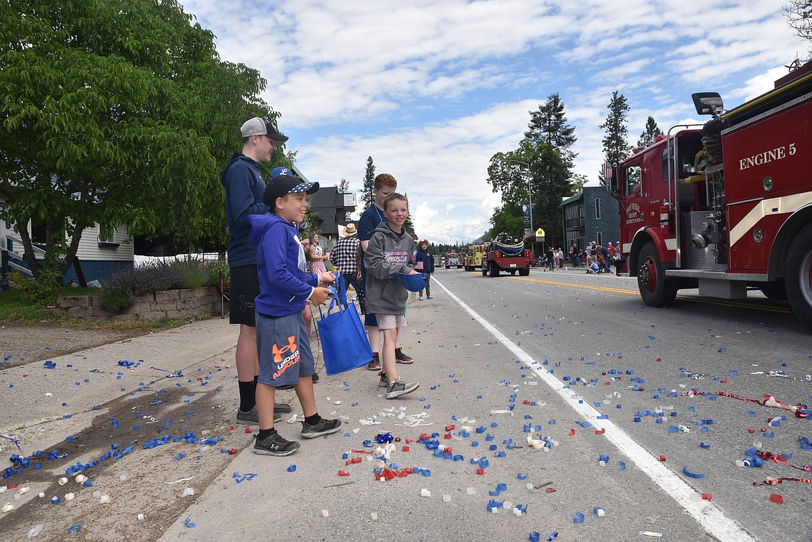 Children were busy collecting candy on Monday during Troy's Old Fashioned Fourth of July parade. (Scott Shindledecker/The Western News)