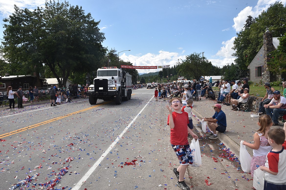 Candy catching became a sport on Monday during Troy's Old Fashioned Fourth of July parade. (Scott Shindledecker/The Western News)