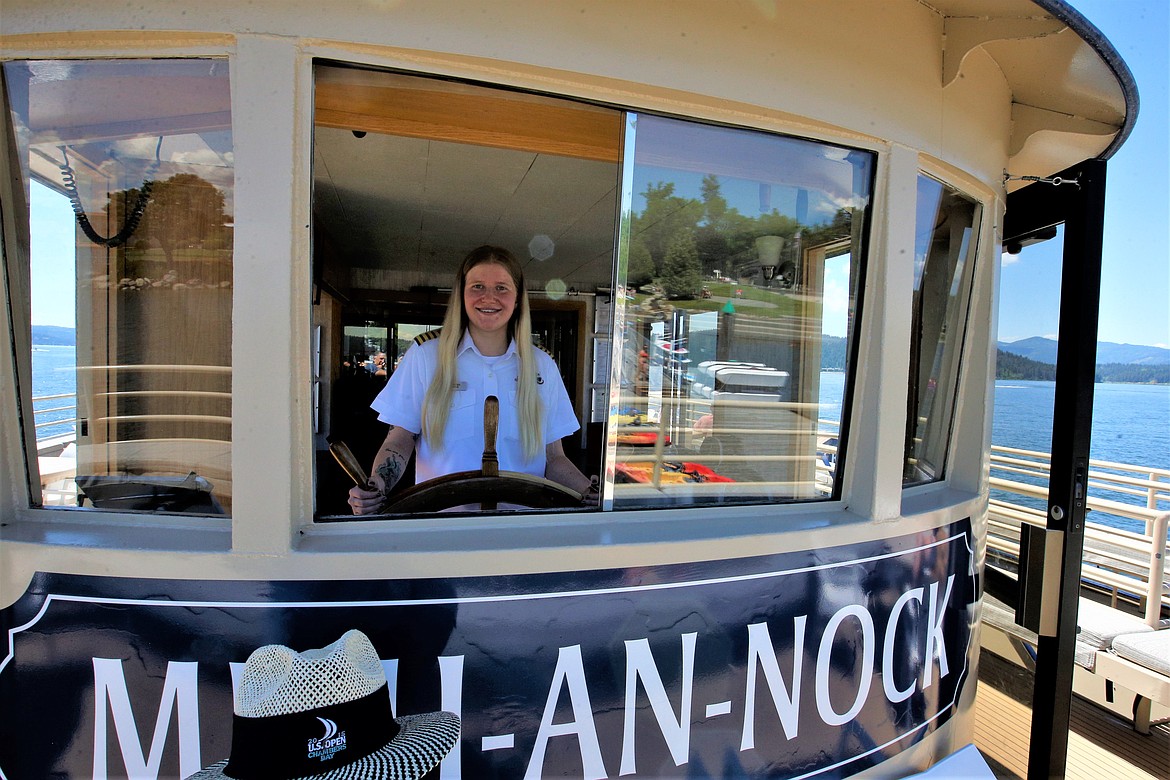 Capt. Jessie Demery is behind the wheel of the Mish-an-Nock with Lake Coeur d'Alene Cruises.