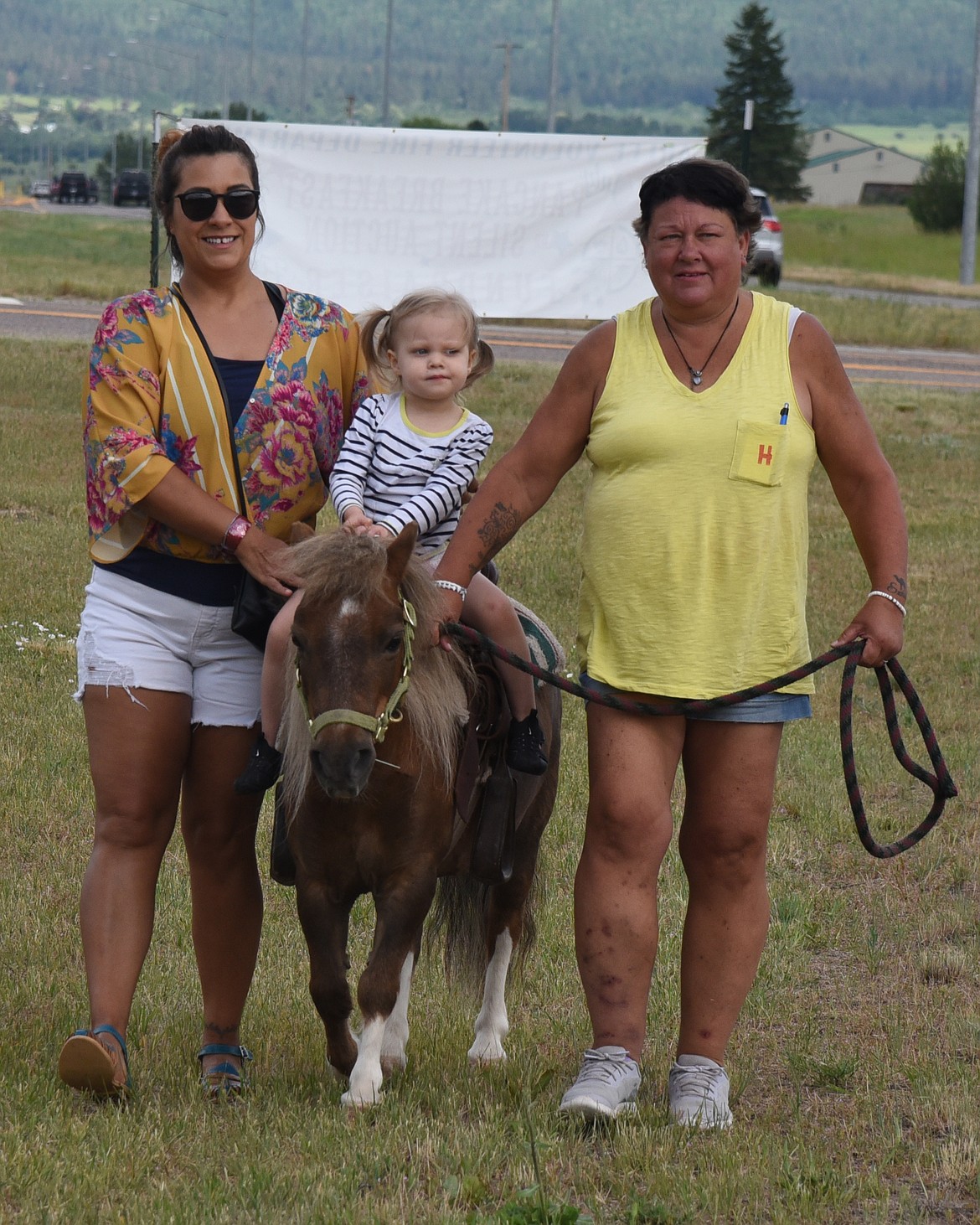 This little gal was treated to a pony ride at the Freedom Fest. (Marla Hall/For the Leader)