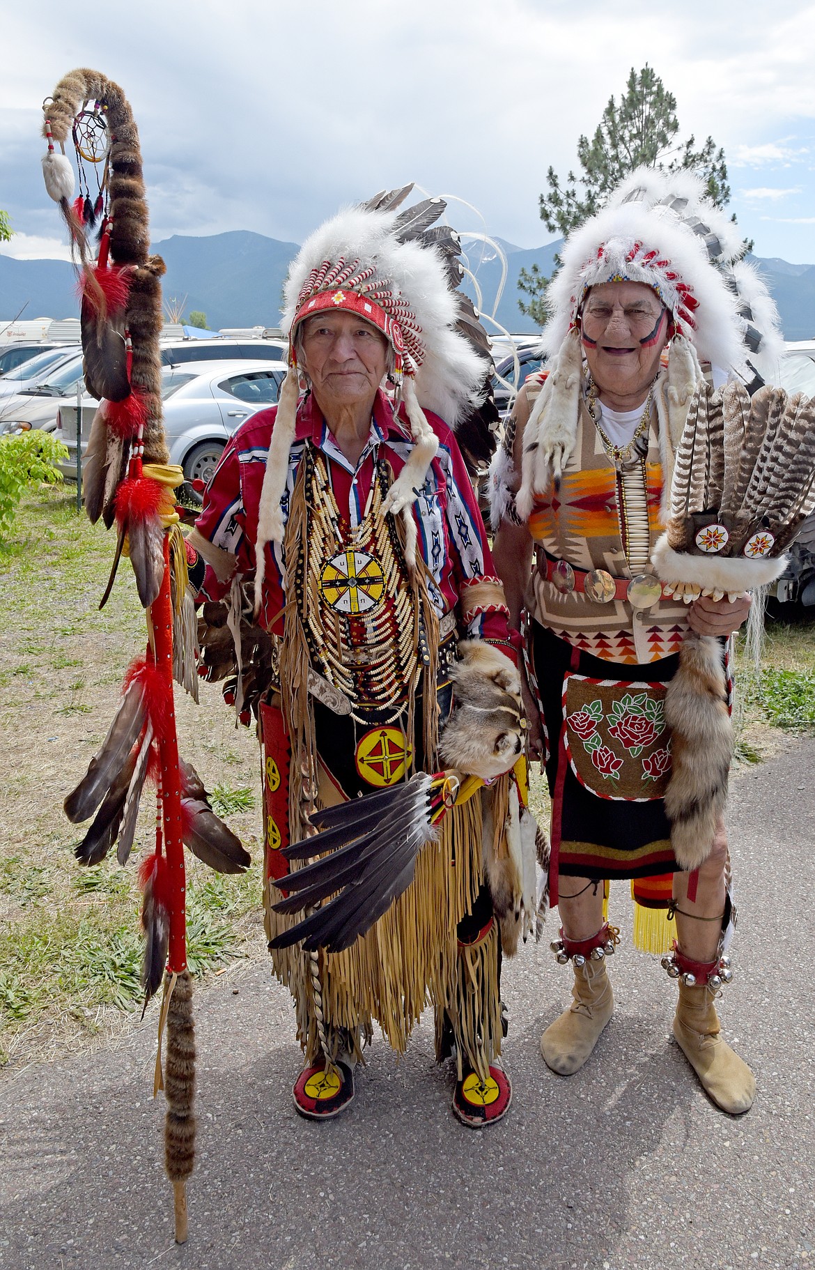 Steven Small Salmon and Darcy Maiers, two local elders, prepare for the Grand entry. (Marla Hall/For the Leader)