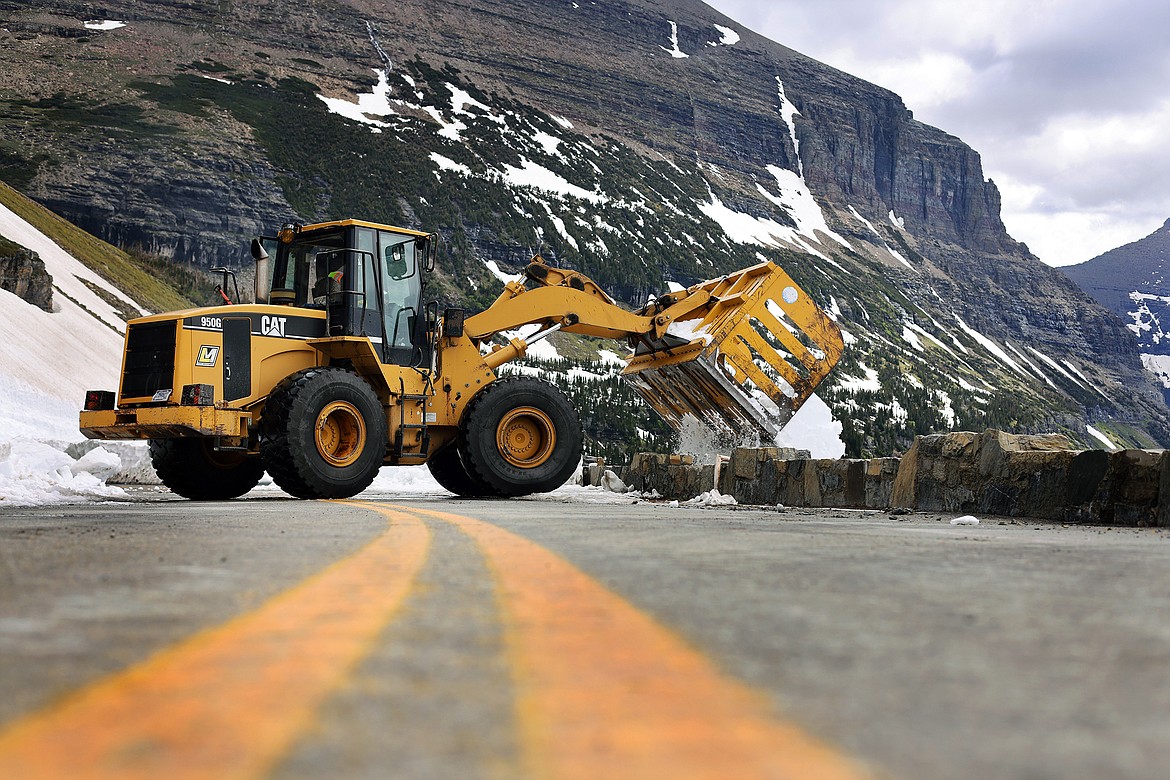Crews work to clear snow from the Going to the Sun Road in Glacier National Park Tuesday, July 5. (Jeremy Weber/Daily Inter Lake)