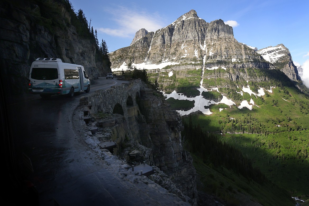 Crews are still working to install the more than 500 wooden guardrails on the Going to the Sun road in Glacier National Park. (Jeremy Weber/Daily Inter Lake)