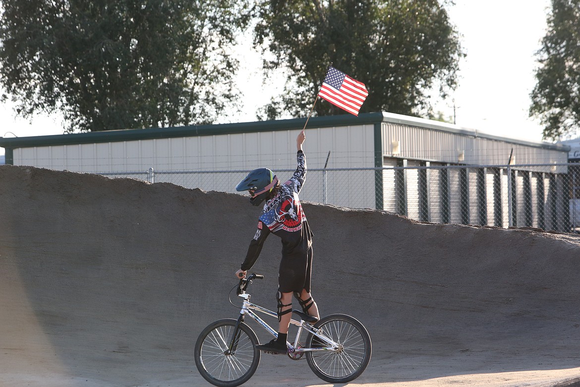 The races began with the national anthem, with riders holding small American flags and riding throughout the course.