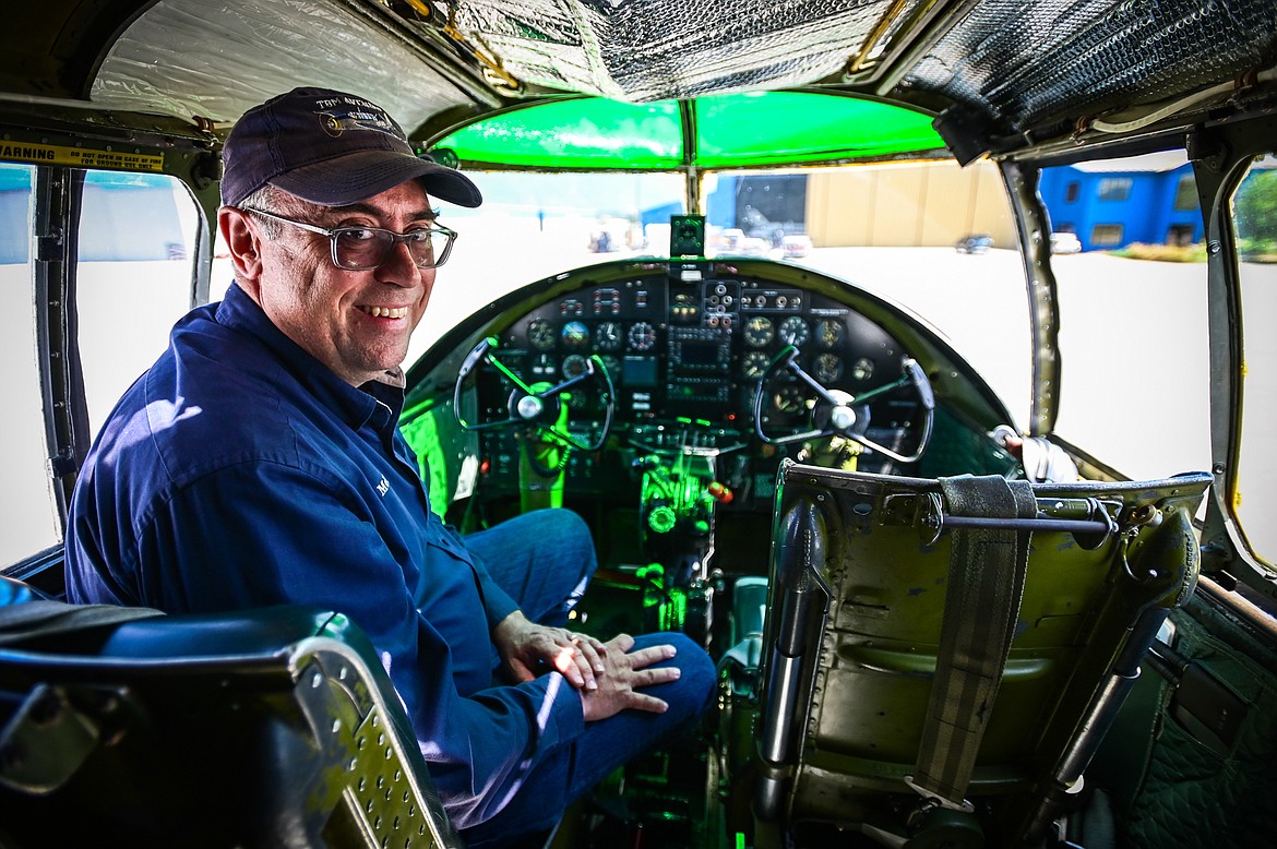 JP Mellor, one of two pilots with the B-25 Mitchell "Maid in the Shade" from The Airbase Arizona Flying Museum, inside the plane's cockpit on Tuesday, July 5. (Casey Kreider/Daily Inter Lake)