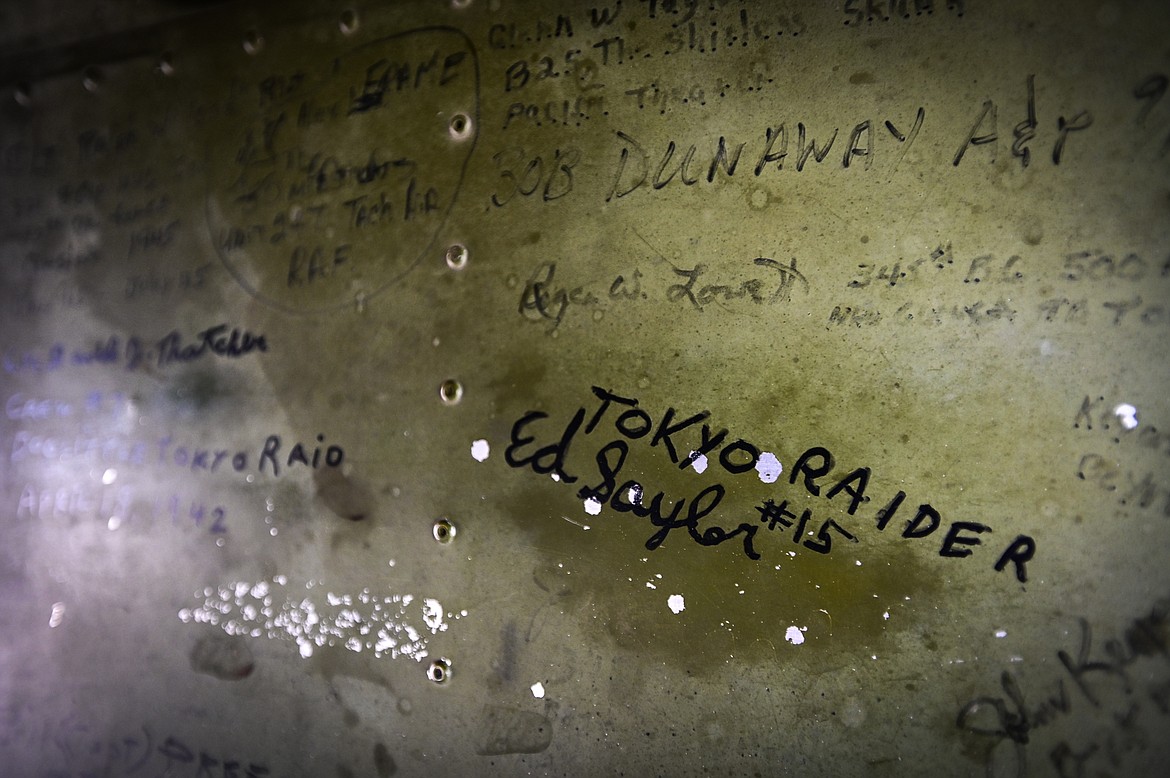 Signatures on the underside of the B-25 Mitchell "Maid in the Shade" from The Airbase Arizona Flying Museum on Tuesday, July 5. (Casey Kreider/Daily Inter Lake)