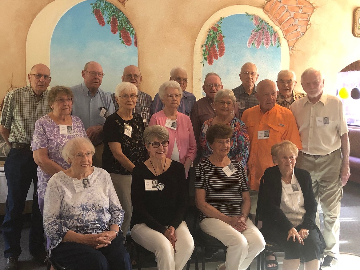 The Flathead County High School Class of ’52 recently gathered for its 70th reunion.
Pictured first row, left to right, are Ellie Mellem Naumann, Lois Byrne Lyford, Geneva Sonstelie Van Rinsum and Rosemary Aker Hillstead; second row, Carol Luke Richmond, Pat Bellmore Odegaard, Joanne Martinson Unger, Sydne Ferree Smith and Hal Gillet; top row, Les McKean, Wally Fowler, Gilbert Passmore, Don Blasdel, Les DeLange, Dave Oursland, Glen Kao and Ron Johns.
Ten classmates and six family members attended an open house Friday evening, July 1, at the home of Lois Lyford.  Seventeen classmates and 16 family members attended the prime rib and parmesan chicken buffet held at Vista Linda Saturday, July 2.
Alumnus Les DeLange was accompanied by his granddaughter Danielle who flew in from Georgia for the occasion.