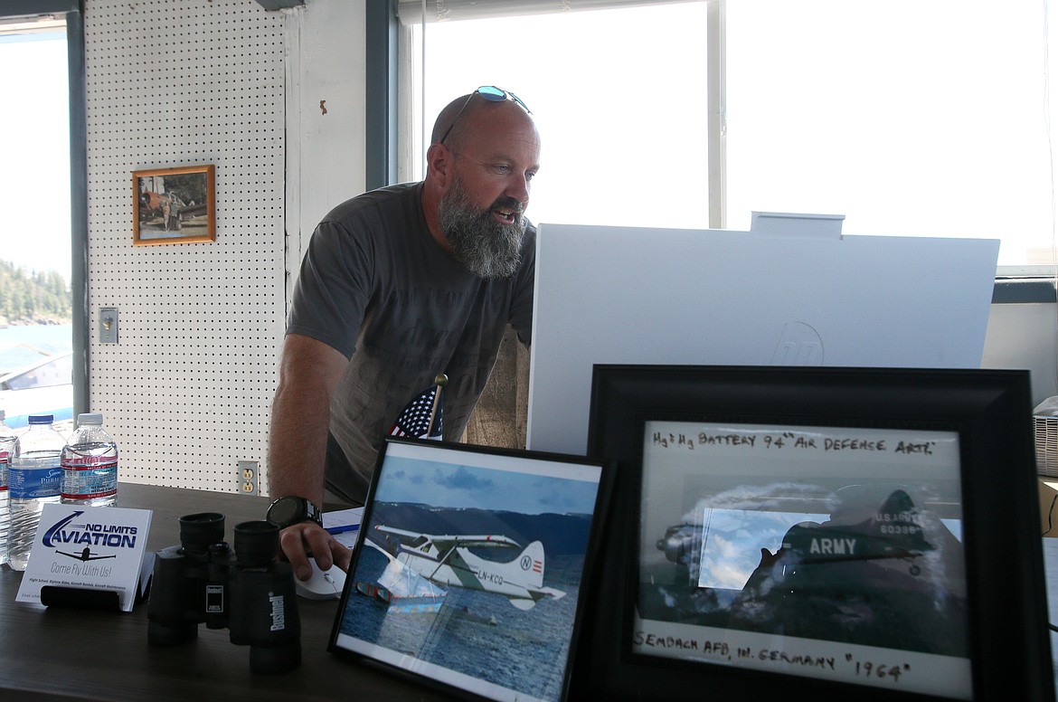 No Limits Aviation and Brooke's Seaplane owner Shane Rogers is seen here Wednesday in the Brooke's Seaplane office on the dock at Independence Point in downtown Coeur d'Alene.