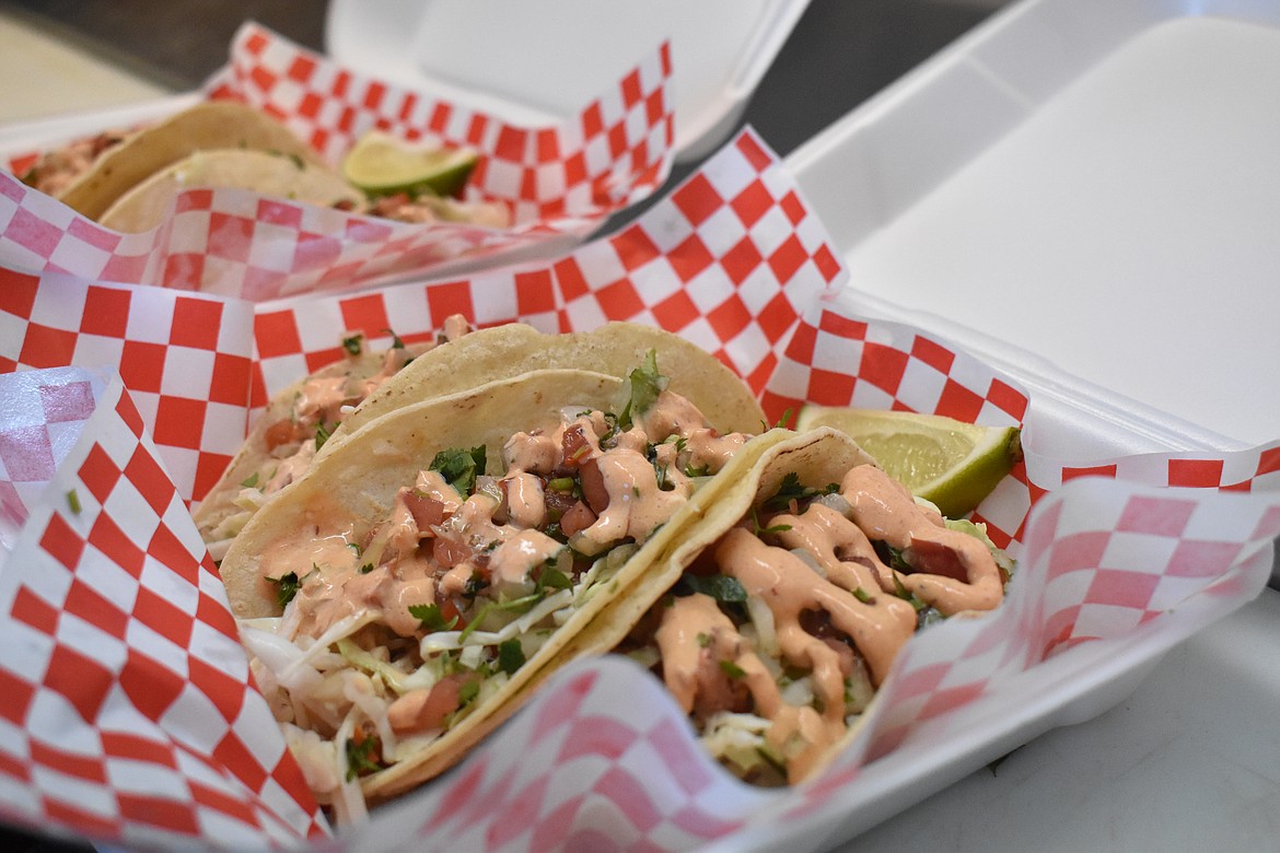 Fish and shrimp tacos are available on Porky’s Clubhouse Grill’s menu that is different from their usual offerings at their hot dog truck.