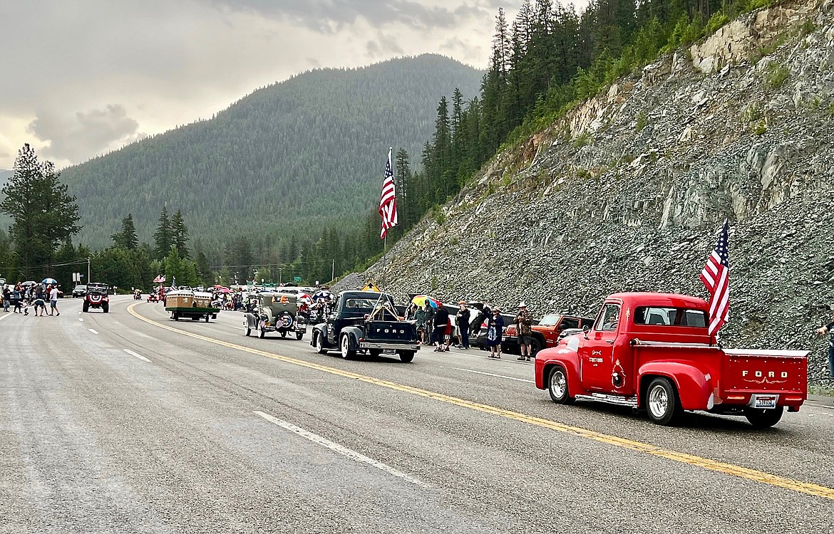 Line of classic cars at the Eastport Fourth of July Parade.