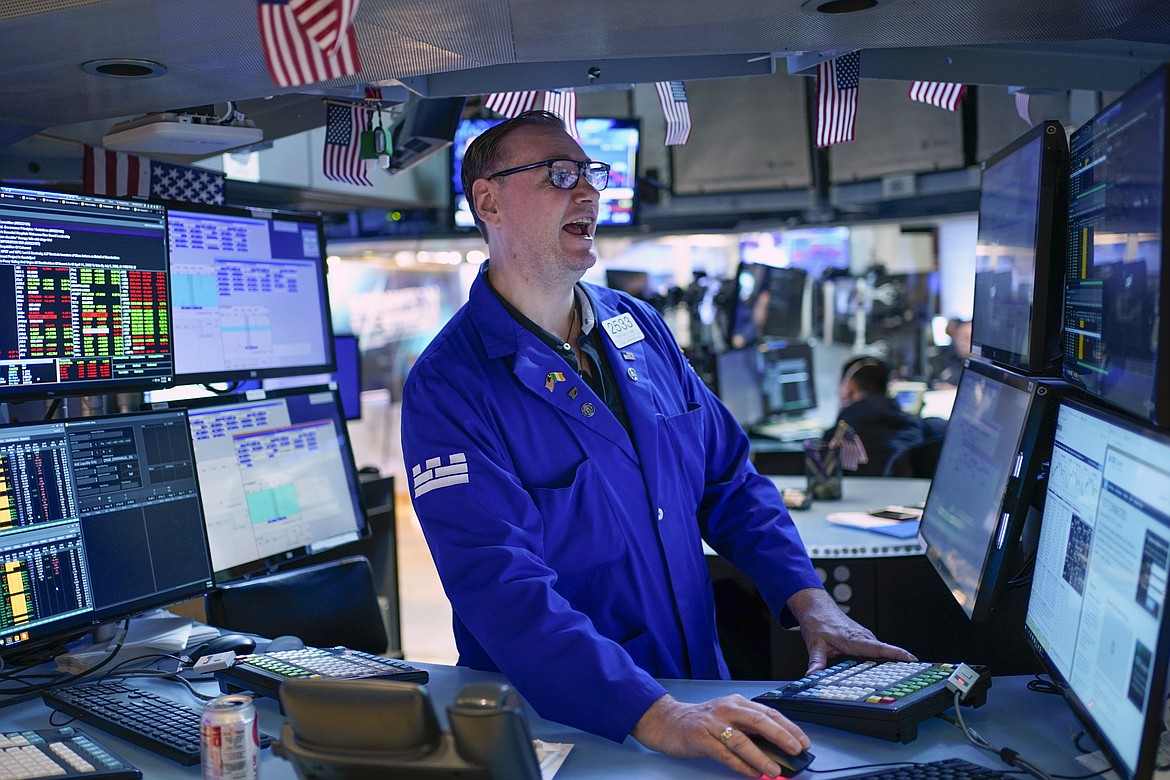 Traders work on the floor at the New York Stock Exchange in New York, July 1, 2022. A new poll from The Associated Press-NORC Center for Public Affairs Research shows an upheaval in priorities just months before critical midterm elections. (AP Photo/Seth Wenig, File)