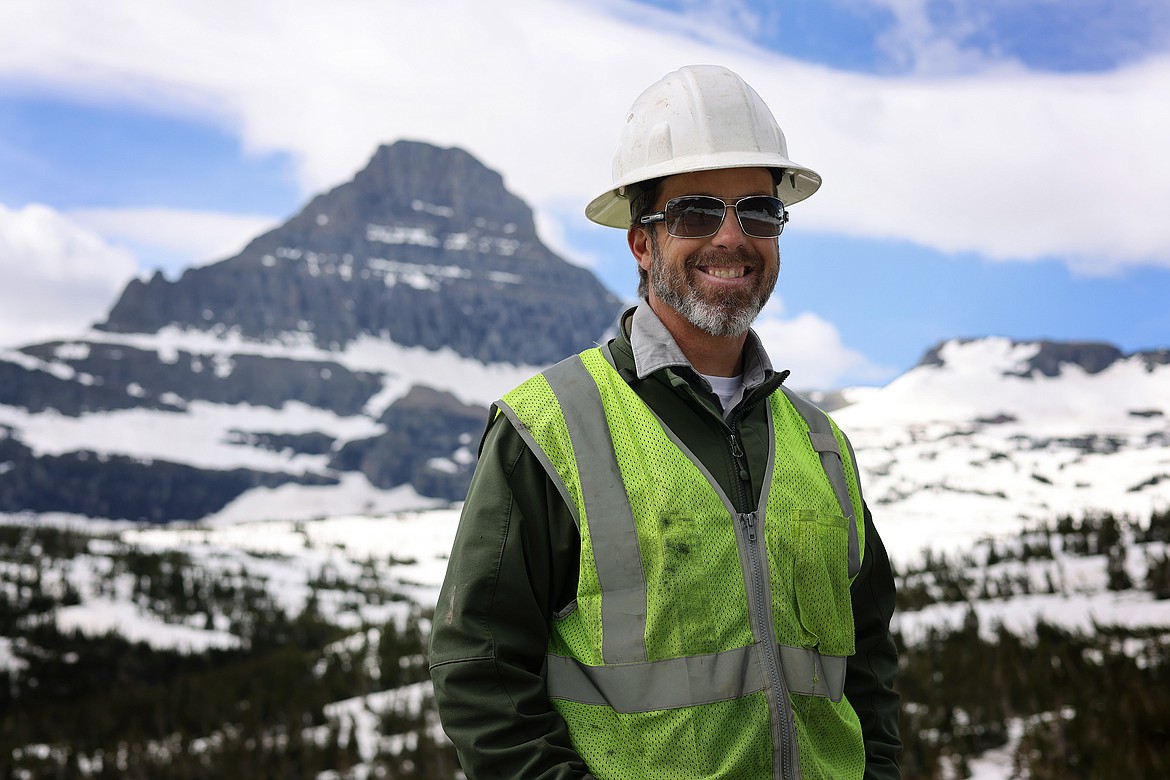 Christian Tranel takes a break from clearing snow on Logan Pass Tuesday, July 5. Tranel has worked helping clear the Going-to-the-Sun Road each spring since 2011. (Jeremy Weber/Daily Inter Lake)