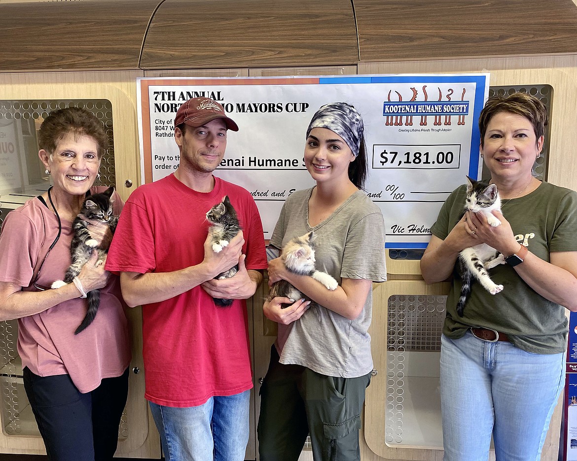 From left: Grace Spagnola, David Espen, Tessa Moreno and Juanita Trapp at the Companions Animal Center, formerly Kootenai Humane Society. The four kittens are all siblings and are available for adoption, along with 29 other kittens and 25 cats.