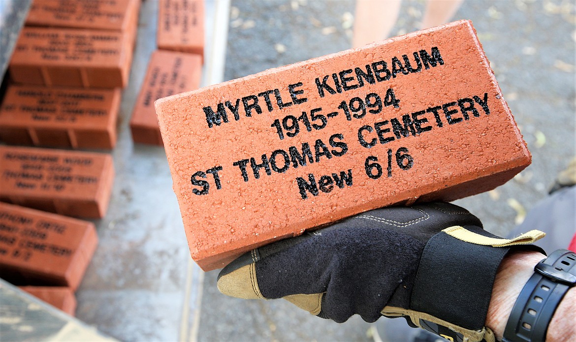 One of the pavers going in unmarked gravesites at St. Thomas Cemetery.