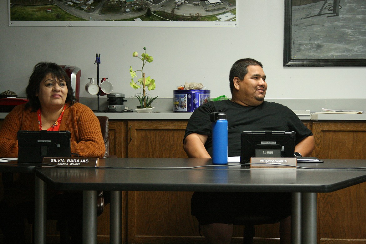 Mattawa City Council members Sylvia Barajas (left) and Tony Acosta (right) listen to an annexation moratorium discussion at the June 16 council meeting. Council members voted to reverse the decision they made June 16 and impose a moratorium on annexation applications.